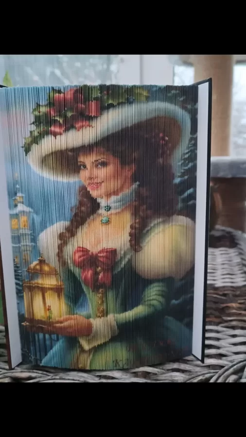 Fotócsíkos
A módszerhez érdemes 350-450 oldalas és 25 cm nél magasabb könyvet választani.